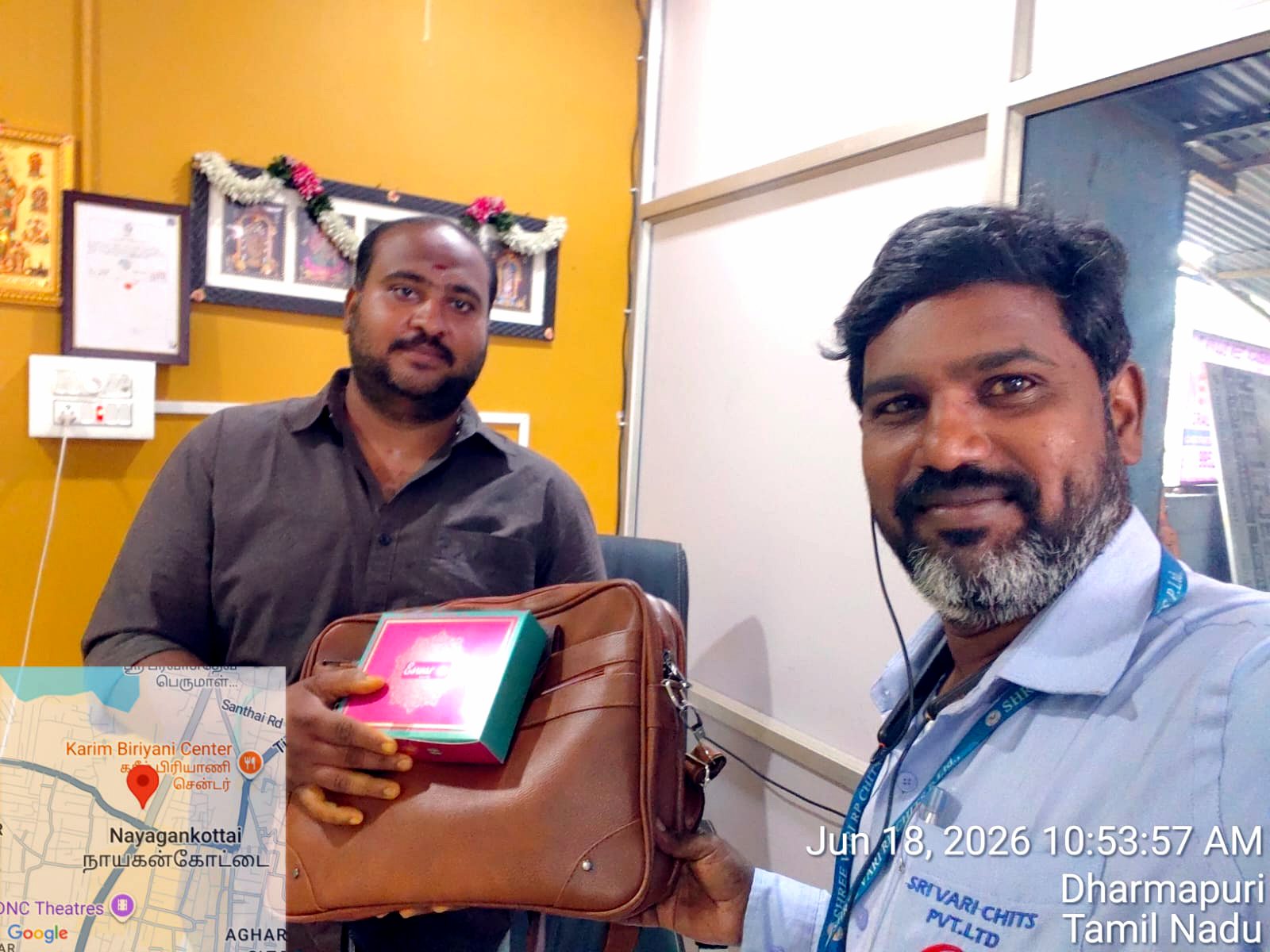 A customer receiving a welcome gift at the branch