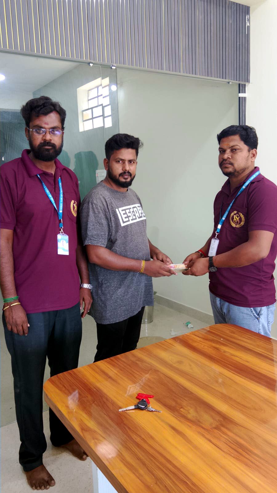 A customer handover moment at the branch